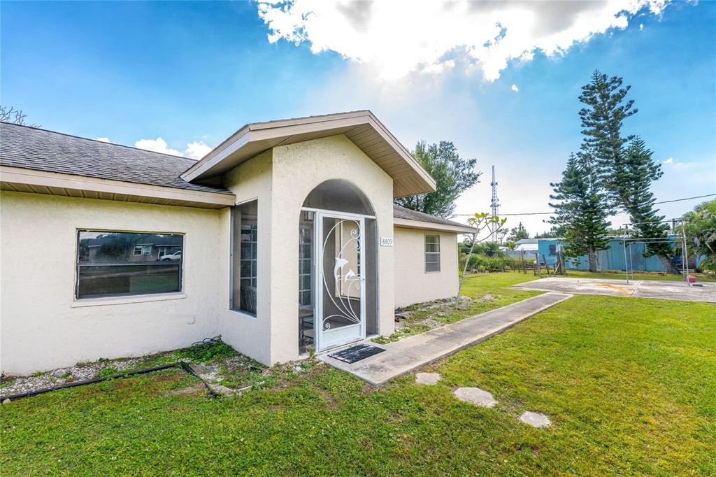 Photo of 8409 Roosevelt Street, Englewood, FL 34224 (MLS # D6144472)