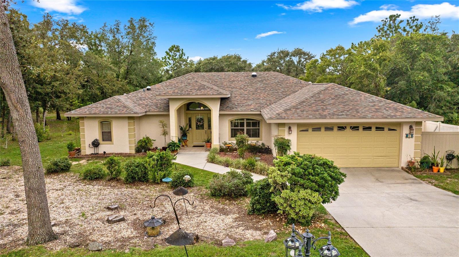 Welcome to your dream home! This beautifully maintained 1 owner home is a 3-bedroom, 2-bathroom pool house in the heart of Inverness is perfect for families and entertainers alike. The spacious bedrooms are filled with natural light, and the master suite boasts an en-suite bathroom featuring a luxurious Jacuzzi jet tub, updated sinks and granite countertops along with a generous walk-in closet.
The modern bathrooms are equipped with contemporary fixtures, ensuring comfort for family and guests. The open concept living area flows seamlessly into the dining space and gourmet kitchen, which is outfitted with granite countertops and a new GE microwave (2020). A brand-new LG dishwasher also adds convenience to this chef's delight for cleanup. The solar tube lighting in the kitchen provides dim nighttime lighting for more security and convenience.
Step into your backyard oasis, complete with a sparkling swimming pool, updated lanai ceiling fan, LED lighting around pool deck and two multli color led lights in ceiling of the lanai. The surrounding patio is perfect for sunbathing or hosting summer barbecues with two speakers on the lania for your music listing pleasure. Pool was resurfaced, sealed and updated with travertine tile and pavers in 2024 Adding to this unique property is a charming Lady Lair/She Shed, offering 160 sq ft of dedicated space for relaxation or creativity, featuring built-in shelving and a cozy porch area.
Additional highlights include new roof in January 2021, a 22 KW full house generator with a buried 1,000-gallon propane tank, an attic solar fan for energy efficiency, and timed LED lighting around the pool area for safety and ambiance. Outdoor LED landscape lighting illuminates the property at night, while installed security cameras provide peace of mind. All access points to the inside are secured with galvanized steel to help prevent any possible vermin.
The beautifully manicured gardens enhance the outdoor experience, and the property is conveniently located near local shops, parks, and schools, with easy access to the Suncoast Parkway. Moreover, a ½ acre lot is available for purchase adjacent to this home, cleared and ready to provide additional privacy.
Don’t miss out on this incredible opportunity! Schedule a private showing today and discover all that this fantastic property has to showcase. Do not miss out on this beautiful property, schedule your showing today!