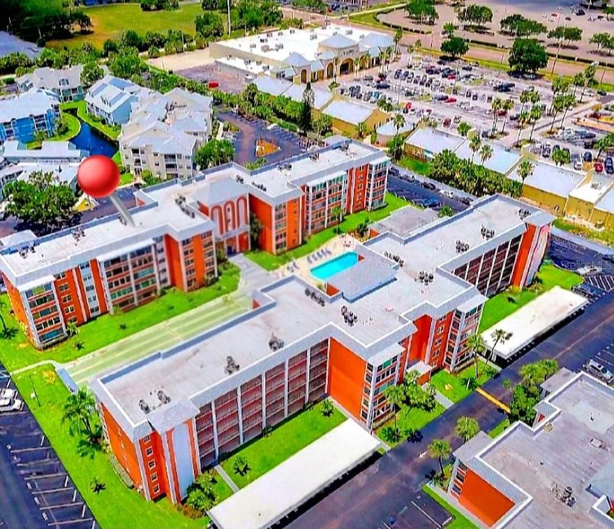 WELCOME TO THE MOST DESIRABLE CROSSWINDS COLONY CONDOMINIUM, RIGHT OFF THE TYRONE MALL!MALL! LOCATION AT IT'S BEST WITH THE VIEW FROM THE COURTYARD AND THE POOL, NO FLOOD ZONE, NO AGE RESTRICTIONS, NO ASSESMENTS, NEVER DEMAGED FROM RECENT HURRICANES! SATISFACTORY MILESTONE INSPECTION! Meticulously super clean and FULLY UPDATED UNIT, the third-floor condo is move in ready and can close quickly. It has NO age restrictions, IT COMES WITH CARPORT #157, right in front of the building and extra PARKING and GUEST PARKING, STORAGE ROOM (302) on the same floor and fully renovated community, with the new roof, painted outside & inside, new epoxy flooring, new landscaping, laundry room on each floor, new elevator, new upgraded pool and now is almost done with renovating clubhouse. This lovable & spacious 1050 sqft features 2 beds/2 baths and sunroom that can be used as a den/ office etc., has an open floor concept, living room/dining room condo with porcelain tile  throughout the entire unit and features many upgrades such as: BRAND NEW KITCHEN with a big breakfast bar ,countertops and many cabinets, extra storage and offer eating space, it has newer appliances ( less than 1 year)  new kitchen sink , faucet, modern backsplash with ambient lighting ,NEW IMPACT ENERGY EFFICIENT WINDOWS ,HVAC unit (2018) new  installed porcelain flooring, new lighting, new ceilings fans on every room, NEW OUTLETS , NEW PLUMBING freshly interior paint, new Chandelier and MODERN LIGHT FIXURES ,FULLY UPDATED MODERN BATHROOMS .PRIMERY BEDROOM has 2 closets, and one is a walk-in closet and bathroom ensuite inside. The second bedroom also has a walk-in closet. Many storages on the hallway with linear closets. On the HOA FEE INCLUDES WATER, TRASH, SEWER, HIGH SPEED INTERNET & TV with over 1000 channels (Spectrum), strong reserves, security cameras, exterior maintenance, storage room, carport, maintenance outside, spacious pool, barbecue grill clubhouse, shuffleboard, elevator, lobby on each building, and exterior insurance. Each floor has a laundry room, bike and storage room. Conveniently located in the best area of St. Pete, midway to downtown, less than 10 minutes to St. Pete beach or Pasadena/ Pass a Grill steps away to the famous Tyrone mall, great access to I- 275 or Clearwater, Tampa, 15 MIN from downtown St. Pete, just walking distance to the restaurants and the biggest shopping plaza in town! Bring the offer today. CONVENTIONAL FINANCING IS ALLOWED! AVAILABLE TO SHOW ANYTIME! THIS UNIT AND COMMUNITY HAS IT ALL.