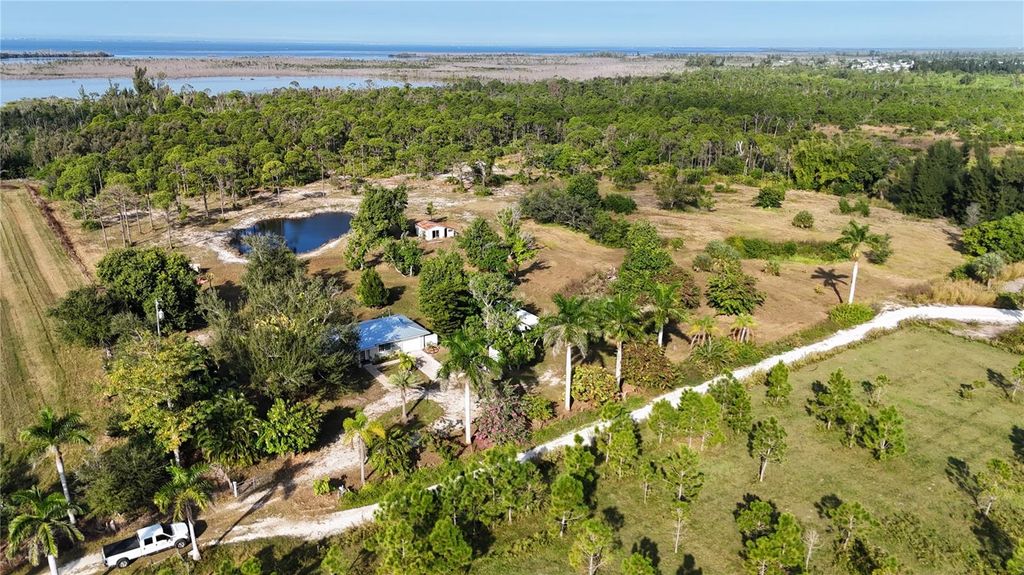 Photo of 4501 Royal Palm Ranch Drive, St James City, FL 33956 (MLS # OM715050)