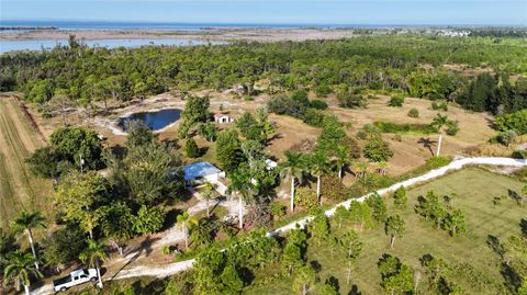 Photo of 4501 Royal Palm Ranch Drive, St James City, FL 33956 (MLS # OM715050)