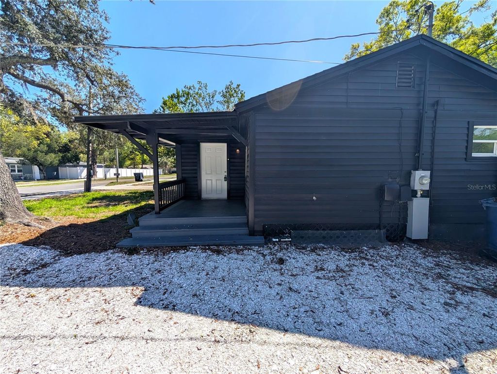 Photo of 8004 N Blvd, Tampa, FL 33604 (MLS # O6393223)