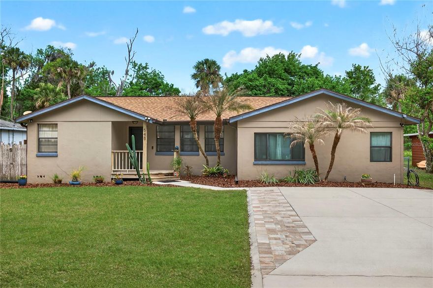 Welcome to a home that just feels right from the moment you walk in. Tucked away on a quiet dead-end street and zoned for highly desirable Port Orange schools, this beautifully remodeled 3-bedroom, 1.5-bath home offers the perfect blend of comfort, charm, and modern updates. From head to toe, everything has been thoughtfully updated, including a newer roof and stylish finishes throughout. Step inside and you’re immediately greeted with warmth, this is the kind of home that feels lived in, loved, and truly cared for. The eat-in kitchen is a standout, featuring stunning stone countertops, brand new cabinetry, open shelving, and views of the expansive backyard. Whether you’re cooking dinner or hosting friends, this space was designed to bring people together. The dining area comfortably fits a large table for gatherings, while the living room offers a cozy yet spacious place to unwind. The primary bedroom is generously sized with a deep closet, and the two additional bedrooms are also nicely sized with deep closets, offering plenty of space for family, guests, or even a home office. A convenient half bath just off the kitchen is perfect for visitors, while the indoor laundry area adds everyday functionality. Out back is where this home really shines. The large, fenced-in yard with a peaceful water view creates the perfect setting for entertaining or relaxing. Picture evenings around the fire pit, slow mornings on the back porch with coffee, and unwinding with a glass of wine as the sun sets, this backyard was made for making memories.