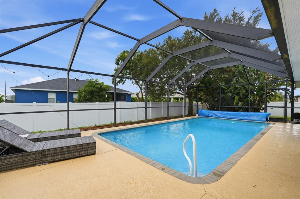 Photo of 413 NW 17th Place, Cape Coral, FL 33993 (MLS # TB8548535)