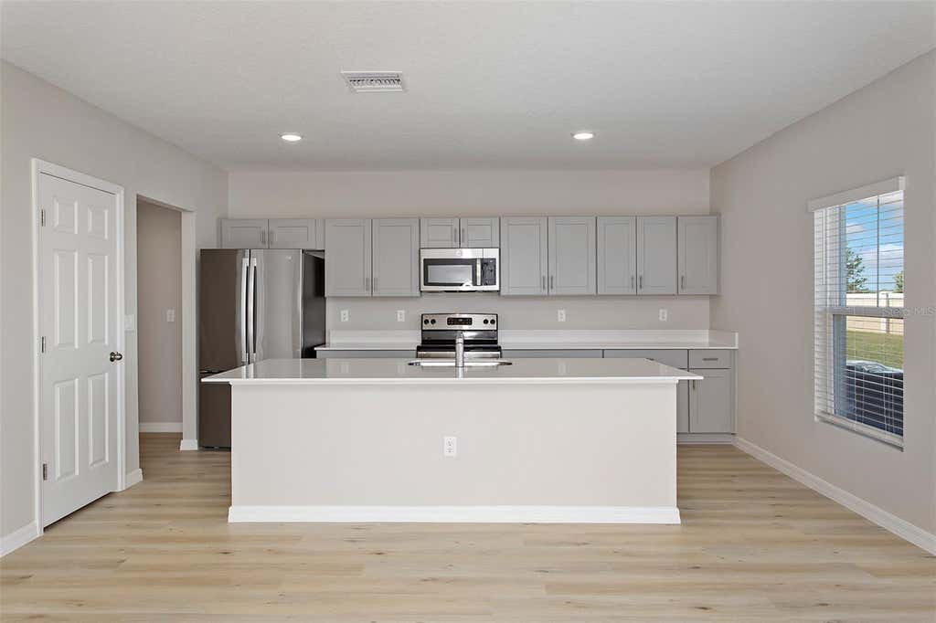 Photo of 4361 Riverbend Boulevard, Haines City, FL 33844 (MLS # TB8525709)