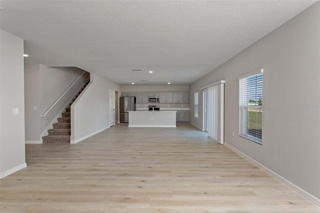 Photo of 4361 Riverbend Boulevard, Haines City, FL 33844 (MLS # TB8525709)