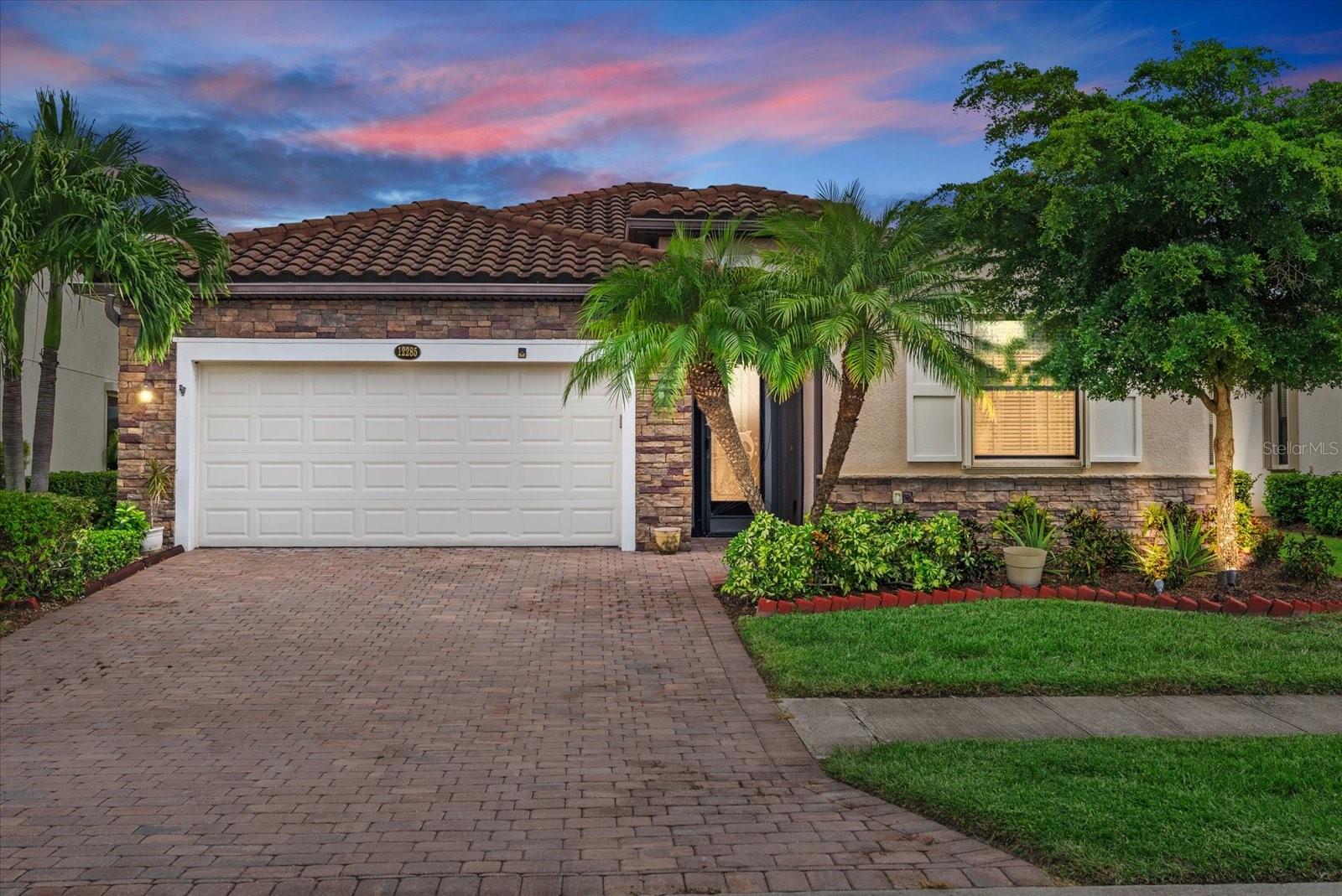 One or more photo(s) has been virtually staged. WATERFRONT POOL HOME IN GRAN PARADISO! Welcome to your stunning 4-bedroom, 3-bathroom Trevi model offering over 2,000 sq.ft. of elegant living space built in 2017. Located in the highly desirable gated community of Gran Paradiso in Wellen Park, Venice, Florida, this home features luxury upgrades, a private heated swimming pool, and tranquil waterfront preserve views—perfect for enjoying the Florida lifestyle year-round.
Inside, discover granite and quartz countertops, an extended kitchen island, upgraded backsplash, wainscoting trim, custom window cornices, and beautiful tile flooring. The gourmet kitchen includes stainless steel appliances, a walk-in pantry, and bar seating ideal for entertaining. The primary suite features custom his-and-her closets and a spa-style bath with garden tub and glass shower.
Step outside to your private lanai oasis with Italian travertine pavers, therapy jet pool, custom lighting, and a new hurricane-rated panoramic screen enclosure with reinforced 6x6 columns and 8-inch beams for strength and peace of mind.
The 2-car garage offers epoxy floors, built-in cabinets, ceiling racks, and attic storage. Additional features include accordion hurricane shutters, new water heater (2024), and whole-home surge protection.
Gran Paradiso provides resort-style amenities—clubhouse, fitness center, sauna, tennis, pickleball, and a lagoon-style pool. Just minutes to Wellen Park, Braves Stadium, shopping, dining, golf, and Gulf Coast beaches.
Schedule your private showing today and experience luxury Florida Gulf Coast living at its finest!