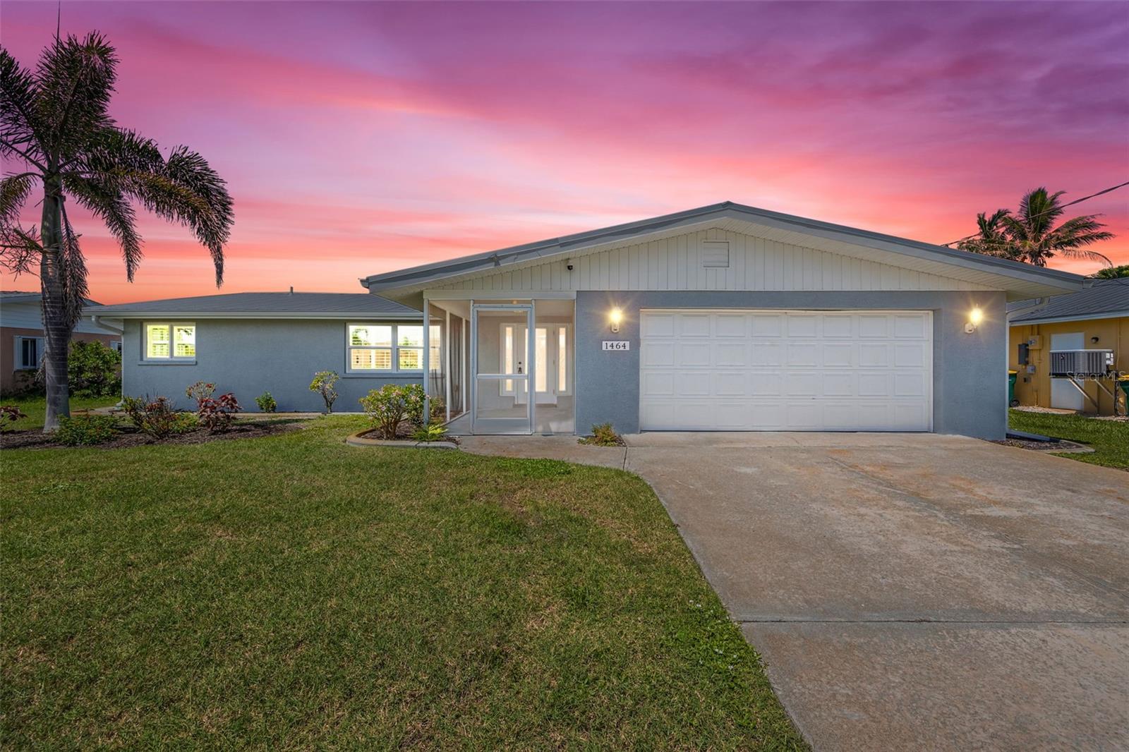 WELCOME TO YOUR FLORIDA COASTAL ESCAPE WHERE RELAXED LIVING MEETS UNBEATABLE WATERFRONT ACCESS! Located just THREE LOTS from LEMON BAY in the quiet enclave of POINT OF PINES, this beautifully renovated home offers DIRECT, BRIDGE-FREE ACCESS TO THE INTRACOASTAL AND GULF OF MEXICO via Stump Pass in under 15 minutes.
Step through the front door and take in SWEEPING CANAL VIEWS through a wall of sliders that span the full width of the GREAT ROOM. The expansive 60-FOOT SCREENED LANAI is the perfect place to sip your morning coffee or unwind at sunset while watching DOLPHINS and MANATEES swim by. With 80 FEET OF CONCRETE SEAWALL and a COVERED BOATHOUSE, you'll enjoy easy boating and the potential to ADD YOUR DREAM POOL between the lanai and the water’s edge.
Inside, the home was FULLY REMODELED and designed for COMFORT AND ENTERTAINING. It features THREE PRIVATE ENSUITE BEDROOMS, including two with DIRECT LANAI ACCESS, an OPEN-CONCEPT LIVING AREA, and a spacious layout ideal for hosting guests. Major updates include IMPACT-RESISTANT WINDOWS AND DOORS and a STANDING SEAM METAL ROOF. This prime location is just TWO MILES from ENGLEWOOD BEACH and minutes to a wide variety of RESTAURANTS, GOLF COURSES, SHOPPING, and MARINAS. Whether you're seeking a SEASONAL GETAWAY or a FULL-TIME RESIDENCE, this home CHECKS ALL THE BOXES for GULF COAST LIVING. SCHEDULE YOUR PRIVATE SHOWING TODAY and experience THE BEST OF FLORIDA’S GULF COAST.