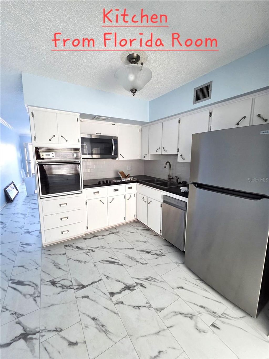 Photo of 2311 Brisbane Street #65, Clearwater, FL 33763 (MLS # TB8440933)