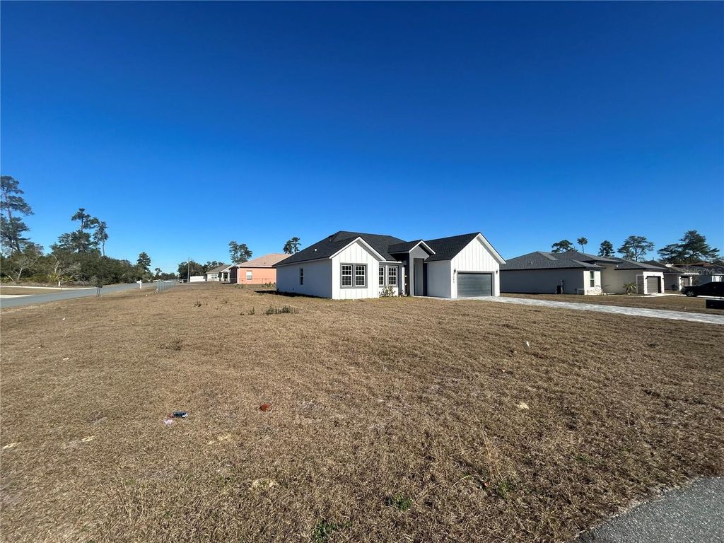 Photo of 3095 SW 131st Place Road, Ocala, FL 34473 (MLS # O6373618)