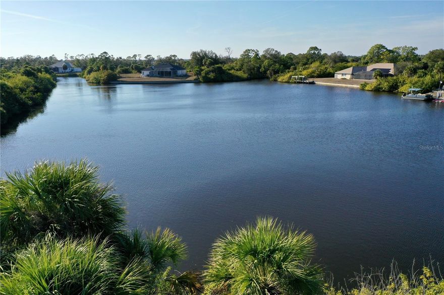 Unlock the ultimate Florida lifestyle on this prime waterfront lot located at 2295 McPhearson Drive. This residentially zoned (RSF3.5) property offers approximately 41 feet of serene lagoon frontage, providing the perfect canvas for your custom coastal retreat. Boaters will love the backyard access via the Dickens Canal, which leads directly to the majestic Myakka River. From there, your saltwater adventures are limitless—explore the Peace River, navigate the expansive Charlotte Harbor, head out into the Gulf of Mexico for world-class fishing, or even chart a course south to the Florida Keys. Beyond the water, this property boasts an unbeatable location that balances tranquility with total convenience. Perfectly positioned just off Hwy 776, the property sits approximately 10 minutes from US-41 and 20 minutes from I-75, ensuring effortless travel throughout the state. You are minutes away from premier shopping at the Port Charlotte Town Center, a diverse array of local dining, and the Charlotte County Sports Park—the Spring Training home of the Tampa Bay Rays. For those who love the outdoors, you can play a different golf course every day of the week or reach the area’s white-sand beaches of Boca Grande or Englewood in under 30 minutes. Don’t miss this rare opportunity to secure a piece of the Florida dream and build the waterfront home you’ve always imagined!