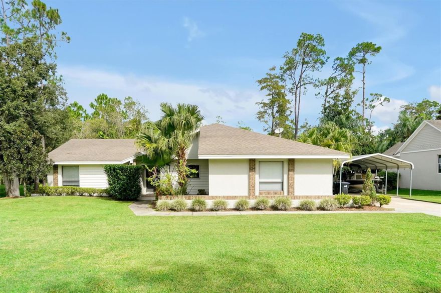 Welcome to your dream retreat in the highly sought-after Isle of Pines Community! This beautifully maintained 4-bedroom, 2-bath single-family home sits on a spacious .34-acre lot and offers the perfect balance of comfort, functionality, and Florida lifestyle.  Step inside and feel instantly at home with an inviting open layout that’s perfect for entertaining. The living room and master bedroom feature French doors leading to a large covered porch and screened pool area — ideal for relaxing or hosting friends and family year-round.  In cooler months, cozy up by the wood-burning brick fireplace with its oversized decorative mantle, a stunning focal point of the living space. The kitchen boasts ample storage, pantry, and an island that provides additional prep and counter space, perfect for the home chef.  The home includes four spacious bedrooms, with one easily adaptable as an office, playroom, or craft room to suit your lifestyle needs. The primary suite offers a true retreat with dual sinks, a step-in shower, and a large walk-in closet featuring built-in shelving.  Outdoors, enjoy a large metal awning (19x30) — ideal for parking your boat, cars, or recreational toys. The property’s generous lot offers both privacy and room to breathe in a serene, country-like setting.  Residents of Isle of Pines enjoy access to community parks, and for those who join the voluntary HOA, private park and boat ramp access are available — perfect for weekends on the water!  Conveniently located just minutes from Orlando International Airport, Lake Nona, and top hospitals, this home also puts you about an hour from the beautiful East Coast beaches and Cape Canaveral.  Experience the best of both worlds — peaceful country living with easy access to Central Florida’s excitement and amenities. Don’t miss this one-of-a-kind property — schedule your private showing today!