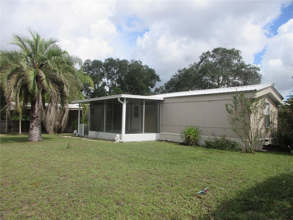Photo of 5515 SE 182nd Terrace, Ocklawaha, FL 32179 (MLS # OM712418)
