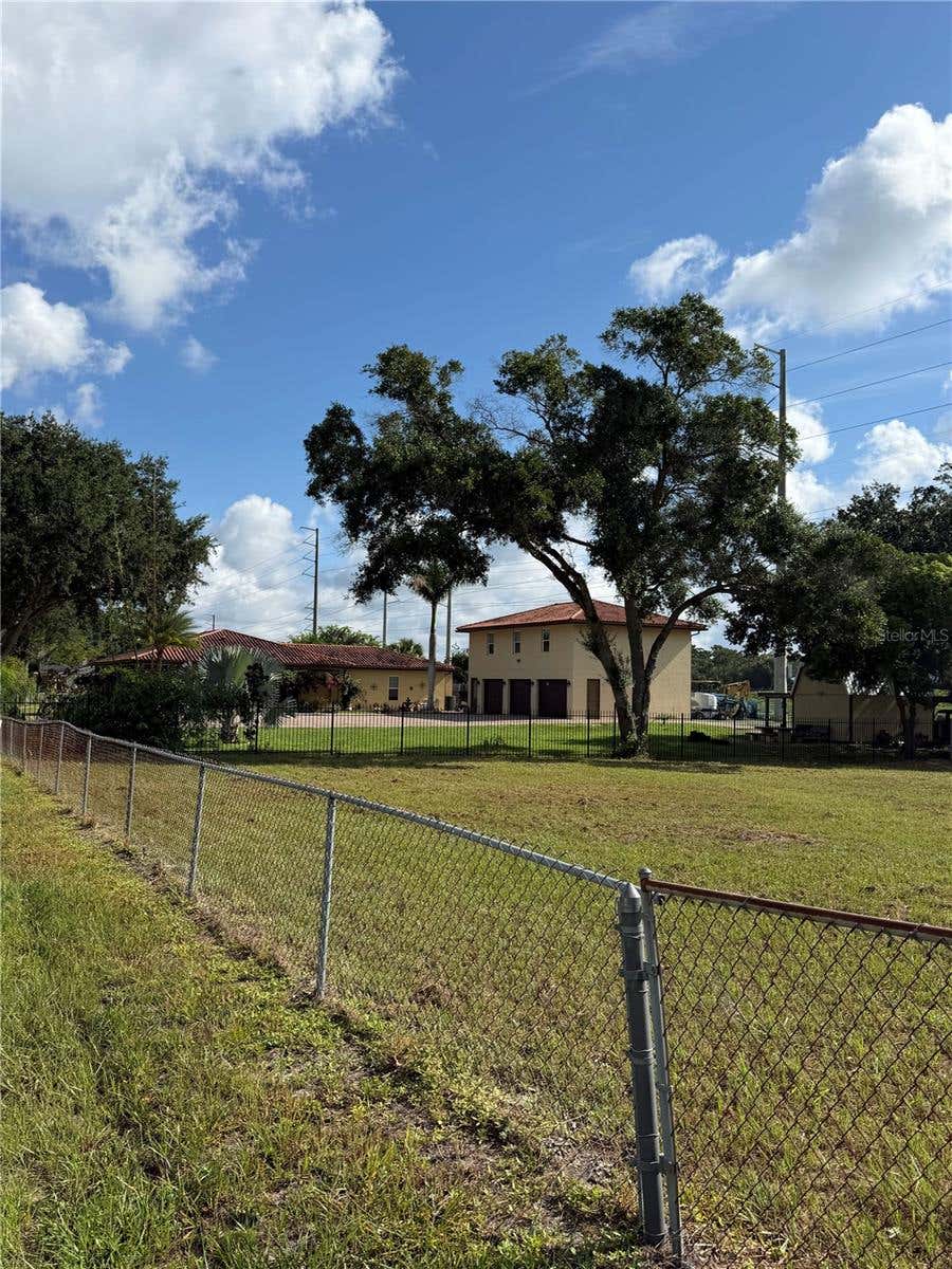 Photo of Econlockhatchee Trail S, Orlando, FL 32825 (MLS # O6433801)