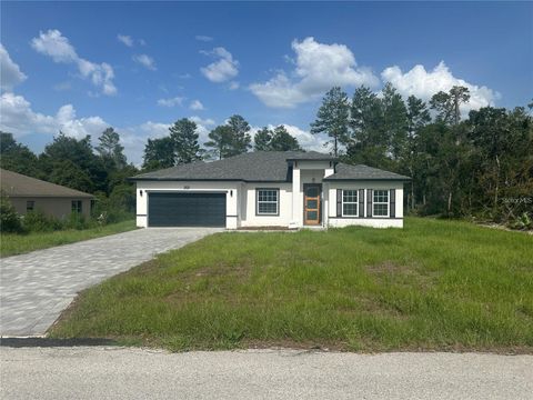 Photo of 2121 SW 153rd Loop, Ocala, FL 34473 (MLS # O6388394)