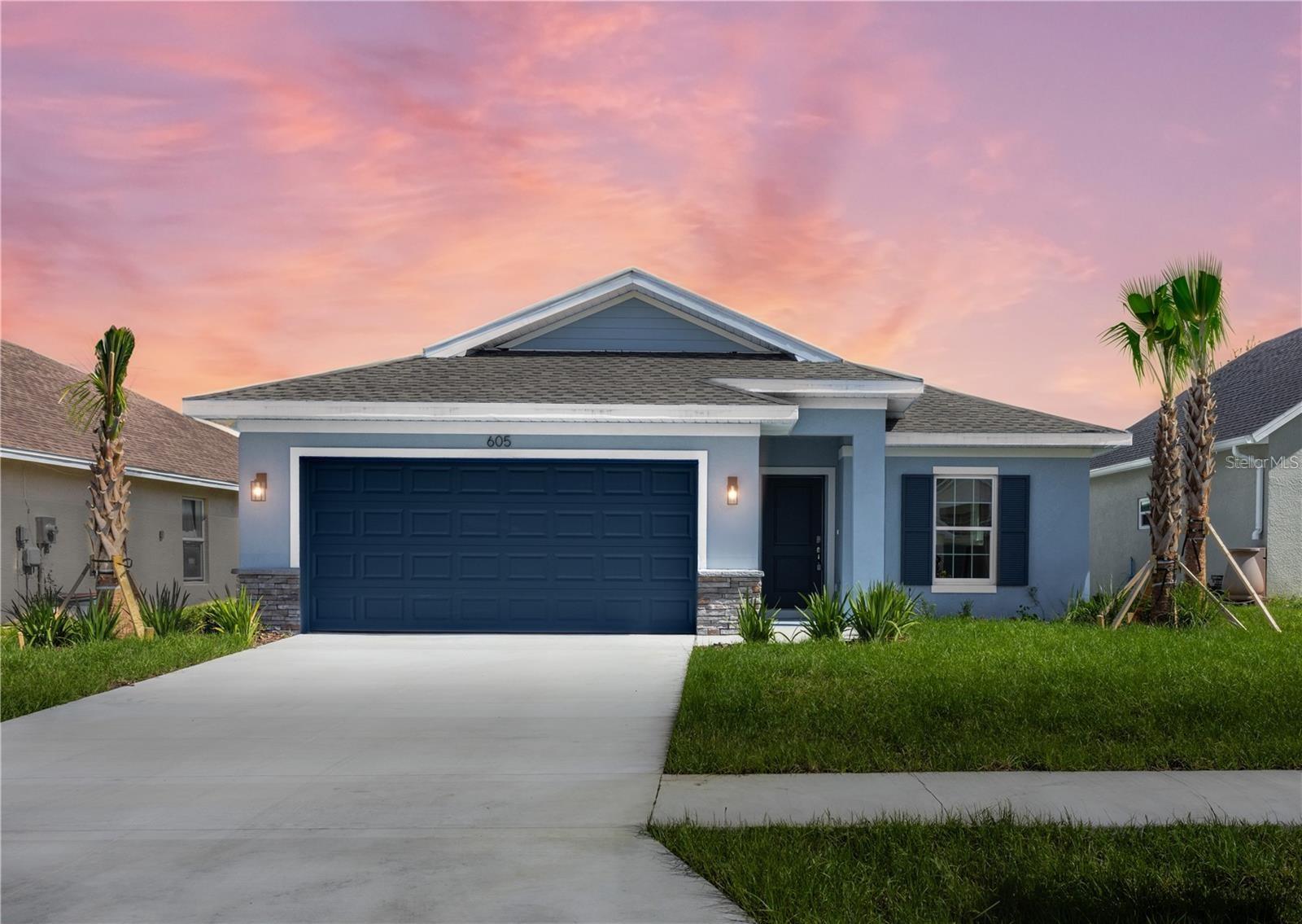 ***NO WAIT, MOVE IN READY!*** Elevate your lifestyle with the opulence of the Anna Maria floorplan presented by Carpenter Homes—a masterpiece within the Florida Living Series, certified by the Florida Green Building Coalition (FGBC). This home features 3 bedrooms and 2 full bathrooms. This dream home is designed and built to immerse you in luxury. As you enter, a beautiful kitchen welcomes you with an expansive, oversized island that seamlessly flows into the living and dining area. The finesse of soft-close, Shaker 42" Shale cabinets, upgraded Fresh Linens 3CM quartz countertops, and Bliss Glass/Stone Smoky Mica Mosaic Tile kitchen backsplash add a functional touch of luxury to the kitchen. Kitchen upgrades include a Moen Sleek chrome kitchen faucet, garbage disposal, and sleek stainless steel energy efficient appliances. This home exudes sophistication with a vaulted ceiling and 3 panel 9 foot sliding glass doors! Additionally, Carpenter Homes provides an upgraded brushed nickel lighting package and a vanity fixture in 2nd bathroom, accenting the overall lighting design. Each bedroom and the great room feature 52" brushed nickel ceiling fans, complemented by an upgraded SEER2 HVAC system to keep you cool and comfortable in the Florida weather. Complimenting the expansive living area is Magnisi 18"x18" white ceramic tile flooring. The Owner's suite offers a luxurious retreat, featuring a shower adorned with 4x16” Anatolia Soho white tiles, complemented by Anatolia Zen Flat Pebble vertical listello accents, and a spacious walk-in closet. The Owner's bathroom features a striking 72x36” contemporary mirror with front and back LED lighting, anti-fog technology, and customizable color settings with a dimmer for the ultimate in modern sophistication. The home boasts Magnisi white 8x12” upgraded tiled walls in the second bath/shower, Fresh Linens 3CM quartz vanity tops, and Moen Genta LX chrome faucets. The ampleness of this home continues with a utility room, and thoughtful additions such as energy-efficient R-4.1 insulation on concrete exterior walls, Taexx tubes for pest control, and fabric hurricane shutters for every window. The Florida friendly landscaped yard is complemented by an irrigation system with rain sensor to help maximize efficiency. This secure community not only enhances the outdoor space's sophistication but also creates an ideal setting for a range of family activities, turning the backyard into a retreat for intimate family gatherings and treasured moments. The expansive 2-car garage, complete with garage door opener and two remotes, not only provides ample space for your everyday needs but also ensures the utmost convenience and versatility for all your storage and parking requirements. Step into a world where extravagance meets eco-conscious living—your forever home awaits, a testament to timeless elegance and modern sustainability. COMMUNITY: Residents enjoy members-only access to the Oak Hollow Recreation Center which includes an exercise room, table tennis, heated swimming pool (no lifeguard), children's playground, tennis court, pickleball, bocce ball court, horseshoes, corn-hole, billiards room, basketball court, picnic tables shaded by beautiful old oak trees, and a lending library. Residents also enjoy a vibrant social calendar filled with community events year-round. Available to view anytime.