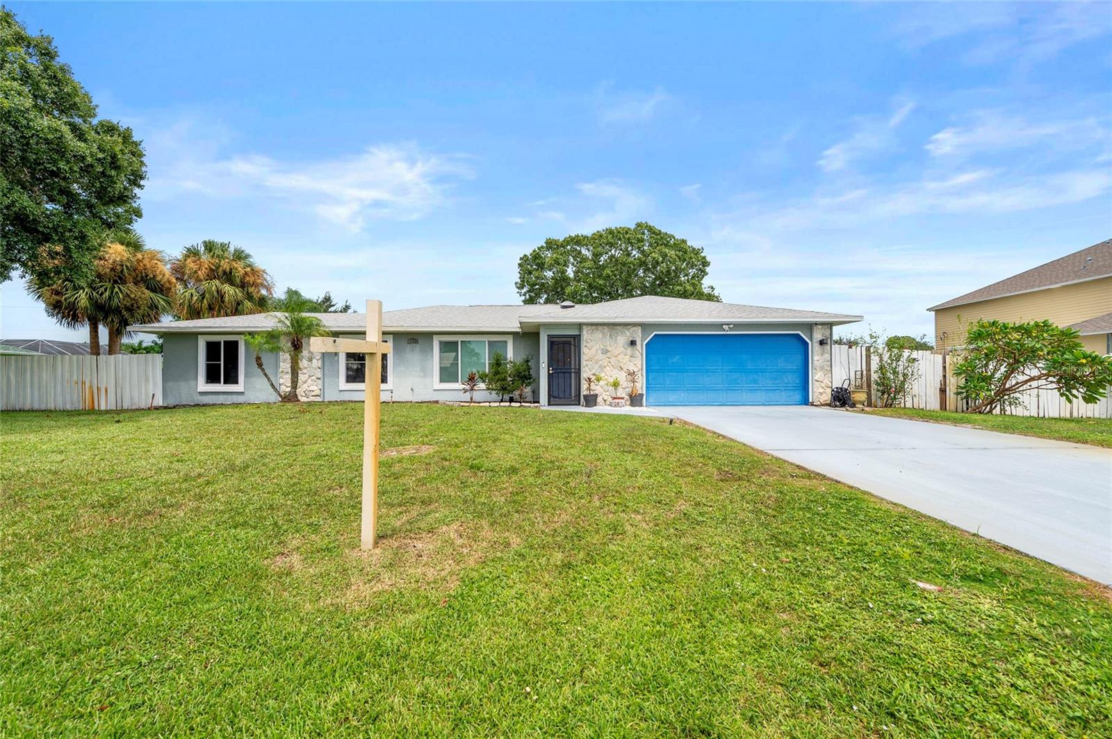 Welcome to Your Port St. Lucie Retreat! You MUST see the size of this yard !! One of the biggest in the Develpoment.This beautifully maintained 3-bedroom, 2-bathroom single-family home offers 1,468 sq ft of comfortable living space in one of Florida’s most desirable coastal communities. This home was appraised and Appraised higher than listed price !! Step inside to discover a bright and inviting interior featuring a modern kitchen with stainless steel appliances, granite countertops, and ample cabinetry—perfect for both everyday living and entertaining. The spacious bedrooms provide comfort and flexibility, while the bathrooms showcase tasteful finishes. With its thoughtful layout and well-kept condition, this home is truly move-in ready. Outside your door, enjoy everything Port St. Lucie has ! From the Botanical Gardens, Savannas Preserve State Park, and Clover Park (home of the NY Mets spring training) to quick drives to Jensen Beach and Hutchinson Island, adventure and relaxation are never far. Plus, with Tradition Square’s shopping, dining, and events, PGA Village golf courses, and easy access to I-95 and the Turnpike, convenience meets lifestyle. Don’t miss the chance to own a piece of the Treasure Coast—where coastal charm, recreation, and modern living come together. has Mango and Avacado trees