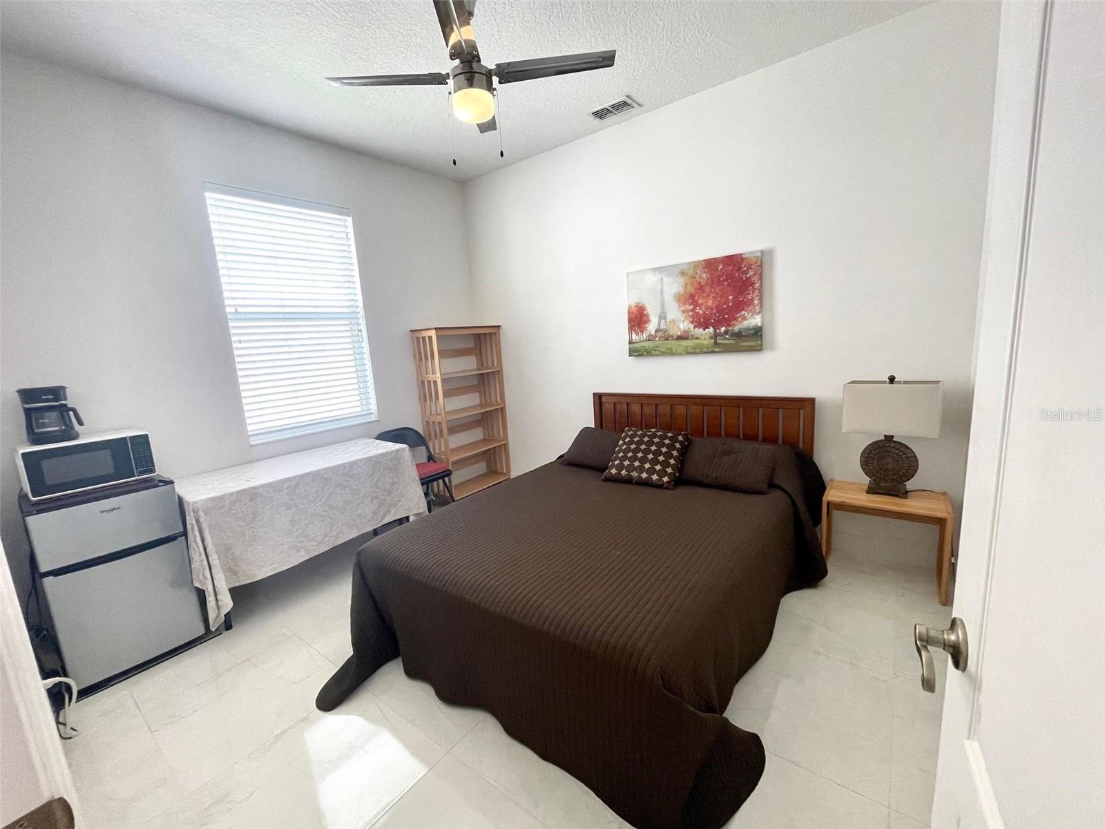 2 Bedrooms and 1 full bath for Rent in a 4/2 split plan single family residence. Both rooms have queen size beds with new mattresses. one bedroom has a wall mounted 40' Smart Tv, a desk and office chair. One room has a 2 door mini refrigerator, a microwave and a coffee maker.Does not include garage parking will need to use street parking in front of the house. Proof of employment and references required.
You can relax and enjoy pond views with a fountain which lights up at night from screen enclosed backyard. Monthly rent includes Electric, Water, Garbage, internet WiFi and home security. Community features tennis courts and a community pool. The community if located within close distance to major shopping area and restaurants.