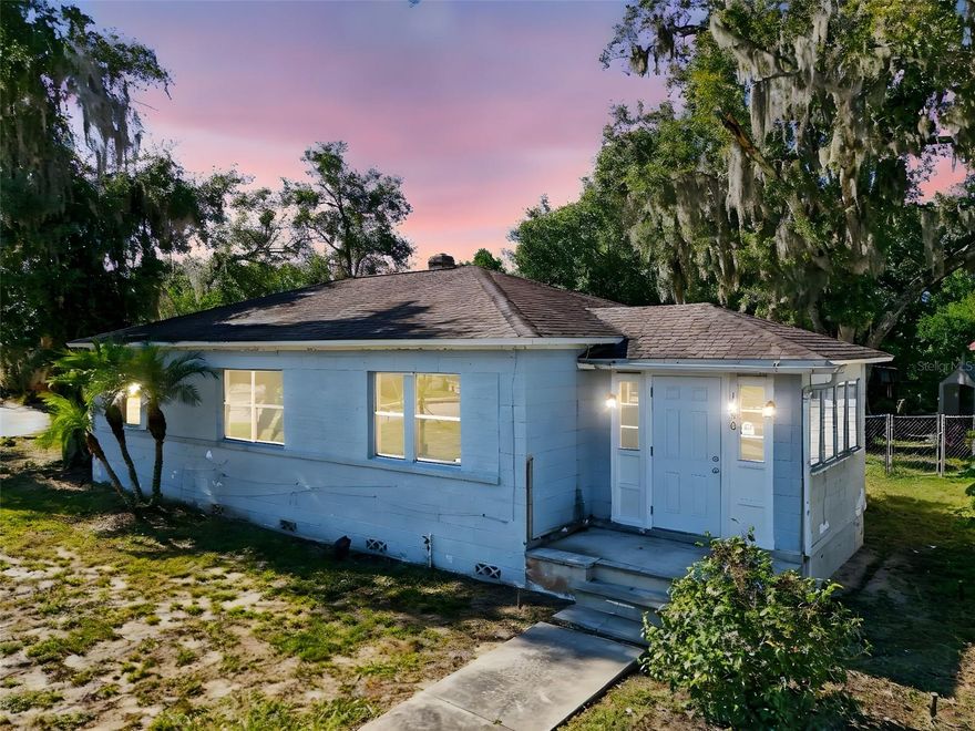 One or more photo(s) has been virtually staged. WELCOME TO THIS UNIQUE OPPORTUNITY IN EUSTIS!
This 3-bedroom, 1-bath property is situated on a prominent corner lot along Orange Avenue (SR-44) and offers a flexible layout featuring a Florida room, dining room, and spacious living room. With two points of entry—from both the front and rear of the property—accessibility and convenience are built in. The property also features 10 dedicated parking spaces, making it an excellent fit for residential or professional use.
Zoned within the Residential Transitional Office (RT) Land Use District by the City of Eustis, this property provides exceptional versatility. In addition to its use as a single-family residence, permitted options include professional services, general office space, limited retail and service businesses, childcare facilities, and even a bed and breakfast. This makes it an ideal property for those seeking a home, a business location, or a combination of both. Beyond the property itself, living or working in Eustis offers the charm of a vibrant community with historic character, a bustling downtown waterfront district on Lake Eustis, and year-round events and festivals. North Lake County is also well known for its natural beauty, rolling hills, and access to numerous lakes, parks, and trails. Its central location provides convenient access to Mount Dora, Tavares, and the greater Orlando area while maintaining a small-town feel. Whether you’re looking for a home, an office, or a mixed-use opportunity, this property delivers flexibility, parking, and value in one of Central Florida’s most desirable locations.