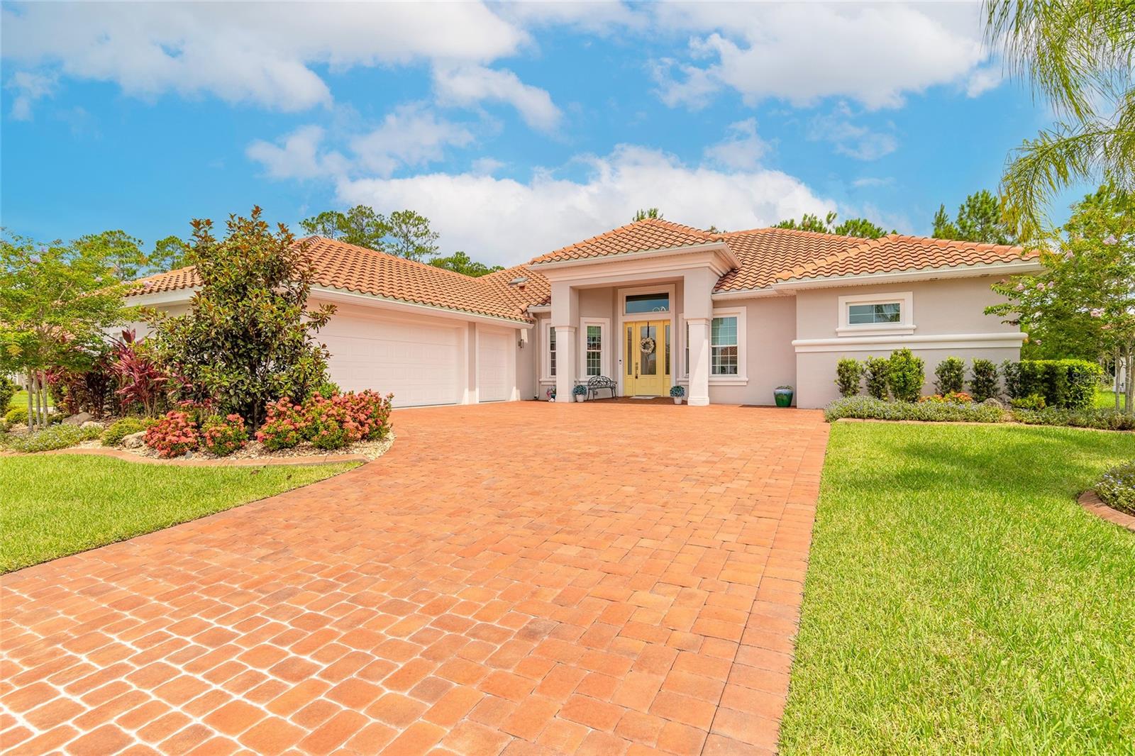 Live the resort lifestyle every day in this beautifully designed 3-bedroom, 3-bath home with an additional office or flex space, perfectly situated on a prime corner lot in the prestigious Venetian Bay community. From the moment you arrive, you’ll be captivated by the classic tile roof, impressive curb appeal, and the elegant vinyl marble flooring that carries throughout the main living areas—offering the ideal balance of luxury and low maintenance. Step inside to a bright, open-concept layout that effortlessly blends the living, kitchen, and dining areas. The living room stuns with soaring tray ceilings, a striking electric fireplace with a rock accent wall, and oversized windows that flood the space with natural light. At the heart of it all is a chef’s dream kitchen—featuring granite countertops, a stylish mix of navy blue and white cabinetry, tile backsplash, stainless steel appliances, a sleek hood vent, and under-cabinet lighting that makes every detail shine. Designed with comfort and privacy in mind, the split floor plan separates the primary suite from the guest bedrooms. The primary retreat features a large walk-in closet and a spa-like ensuite with tile flooring, an oversized walk-in shower, and a double vanity. Need space to work or unwind? The separate home office/flex room offers warm wood flooring and endless versatility. High-end touches like 8-foot interior doors, modern fixtures, and ample storage elevate this home even further. Step outside to your private screened-in pool area, the perfect place to relax, entertain, or soak up the Florida sunshine year-round. A full indoor laundry room with washer and dryer adds everyday convenience. Set within a gated, amenity-rich community, Venetian Bay offers more than just beautiful homes—it’s a lifestyle. Residents enjoy access to a resort-style pool, walking and biking trails, on-site restaurants, a spa, a local market, and so much more—all just minutes from your front door. Don’t miss this rare opportunity to own a move-in-ready pool home in one of New Smyrna Beach’s most coveted communities. All information deemed accurate but cannot be guaranteed.