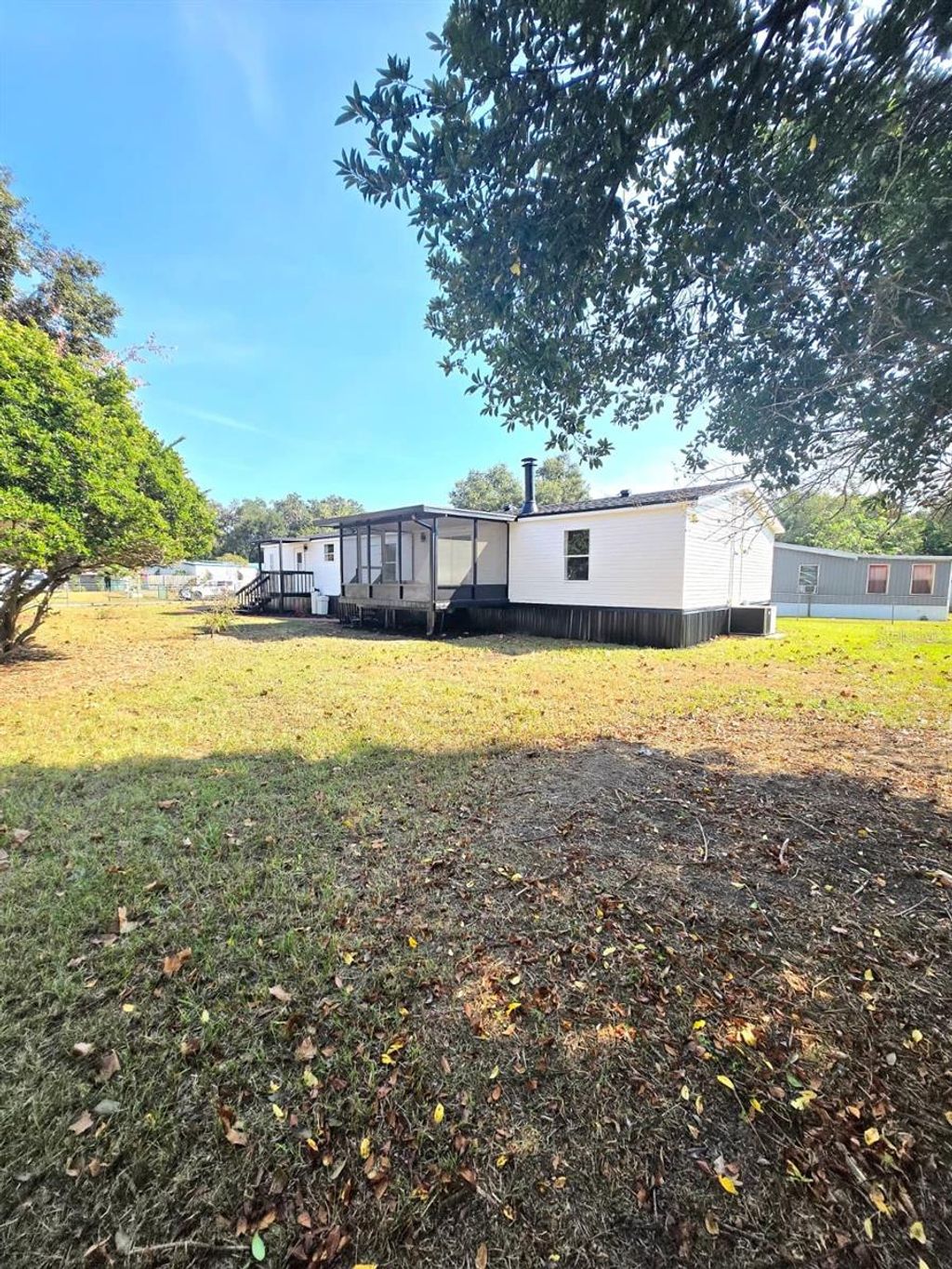 Photo of 4928 Rollinglen Loop E, Lakeland, FL 33810 (MLS # TB8454286)