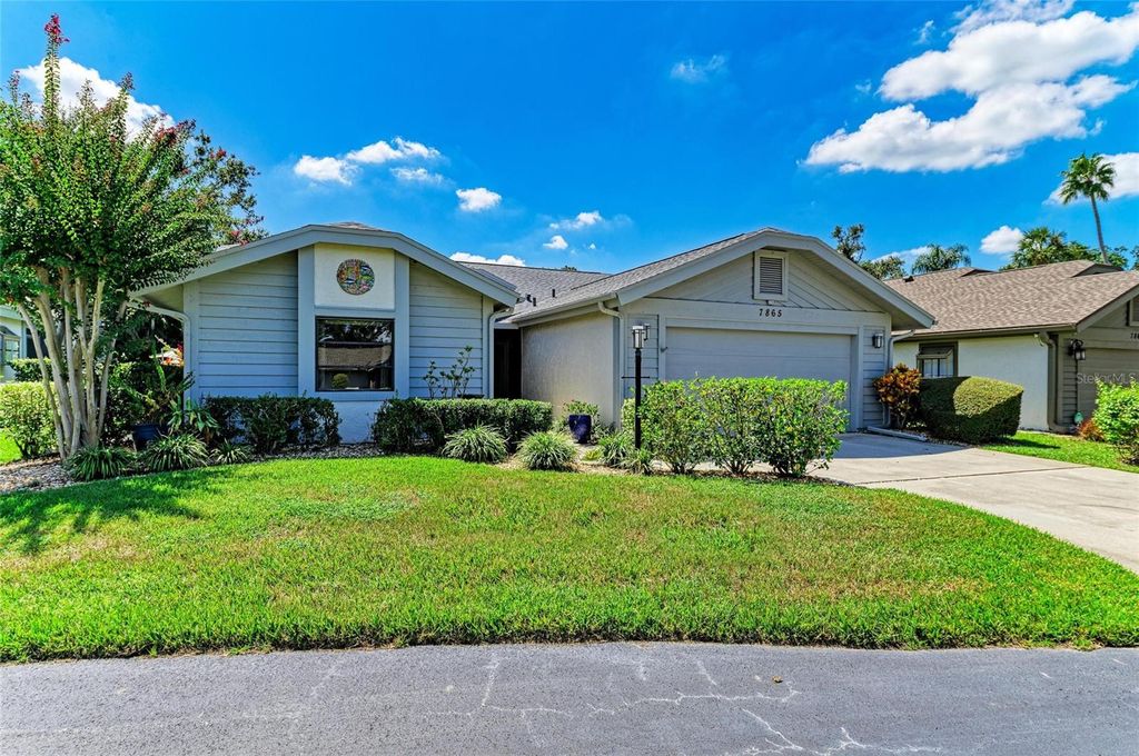 Photo of 7865 Pine Trace Drive, Sarasota, FL 34243 (MLS # A4666116)