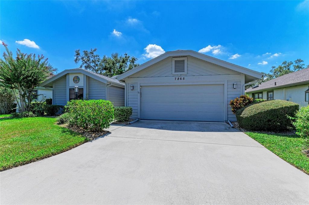 Photo of 7865 Pine Trace Drive, Sarasota, FL 34243 (MLS # A4666116)
