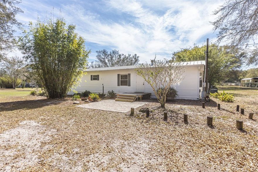 Enjoy the privacy and great location this home has to offer! Minutes from the expanding US HWY 27/441, you can take advantage of the convenience of being close to shopping, grocery, restaurants and much more! Featuring a split floor plan, this mobile boasts +/-1,0642sqft living, 2BR/2BA, living room and open kitchen combo, plus an additional den beautifully accented with a wood plank wall, perfect for your home office! The concrete pad in the back is great for cookouts or relaxing in the Florida Sun. Consisting of +/- 5 acres, you can be confident that any equipment or lawn toys are secure with 6’ chain link perimeter fencing. With this amount of land, privacy, and lawn care included, this home and property will go quick. Interior hallway has laundry hookups (washer/dryer not included). Inquire today! Move in costs are first months ($1500), last months ($1500) and security deposit ($1000). Some restrictions of equipment or recreational vehicles to be stored on property-must first obtain Owner approval. Tenant application approval required for each tenant. No pets, No Smoking.
Security Deposit: $1000
Cleaning Fee: $250
-Tenant application approval required for each tenant
-No Pets, No Smoking
-Lawn Care Included
-Some restrictions on storage of equipment/rec vehicles-inquire first