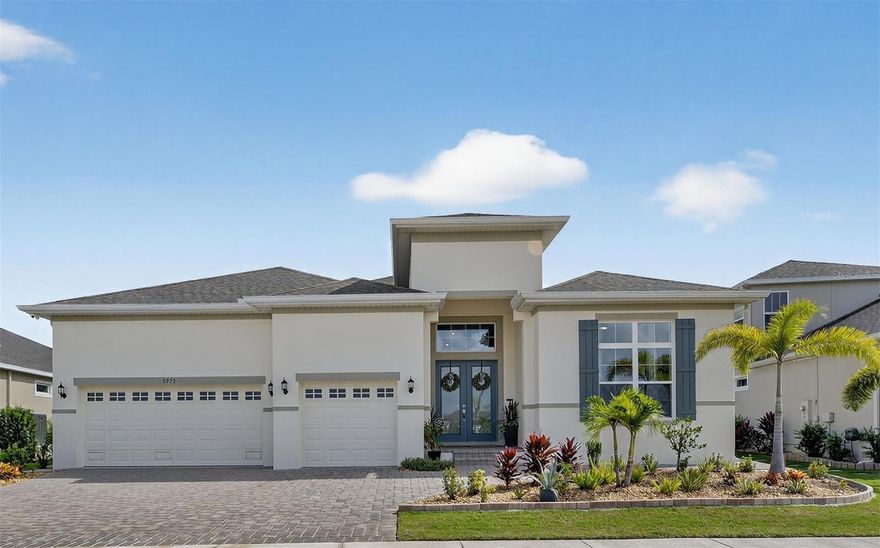 Welcome to Marisol Pointe at MiraBay—your final opportunity to own an almost-new home in SouthShore’s premier master-planned community. This beauty comes with a new boat dock and amazing water views, both front and back.  The featured Cristo Floor Plan is a stunning single-story home with 4 bedrooms and 3 bathrooms, offering 2,983 square feet of open-concept living flooded with natural light. It boasts a grand 13-foot foyer ceiling and 12-foot ceilings throughout the main living areas and bedrooms with upgraded ceiling fans and light fixtures, adding both comfort and contemporary flair to every room.  This home offers a host of modern enhancements designed for comfort, convenience, and style. Outside, you'll find a pre-plumbed outdoor kitchen equipped with water, gas, electric ready for your new outdoor kitchen design—ideal for entertaining. Brand-new gutters improve both function and curb appeal, while a smart home package with security cameras adds peace of mind. The garage features a sleek new epoxy floor and includes 50 AMP EV charging outlets, making it ready for electric vehicles. A thoughtfully designed paver walkway leads from the front of the house directly to the boat lift, ensuring easy waterfront access. The landscaping has been upgraded with all-rock flower beds bordered by stone edging, offering a clean, low-maintenance aesthetic that complements the home's overall appeal. The home overlooks a serene saltwater canal and sits on a deep homesite with extended outdoor living space, including a screen enclosure and oversized spa. Enjoy evenings on your private deck—perfect for fishing—and take advantage of the 10,000 lb. boatlift, seawall, and full utility access with water and electricity.  This vibrant coastal community features world-class amenities and direct access to boating adventures on the bay, all just minutes from Tampa and St. Petersburg’s top shopping, dining, and entertainment. Marisol Pointe offers the perfect blend of luxury and lifestyle, nestled within the sought-after waterfront enclave of MiraBay. Launch kayaks, paddleboards, or simply relax in your waterfront oasis.  As a resident of MiraBay, you’ll also enjoy access to a clubhouse, fitness center, resort-style pool, pickleball courts, parks, tennis courts, basketball courts, scenic walking trails, and much more. This is your last chance to buy new in this exclusive community—don’t miss the opportunity to live where every day feels like a getaway.