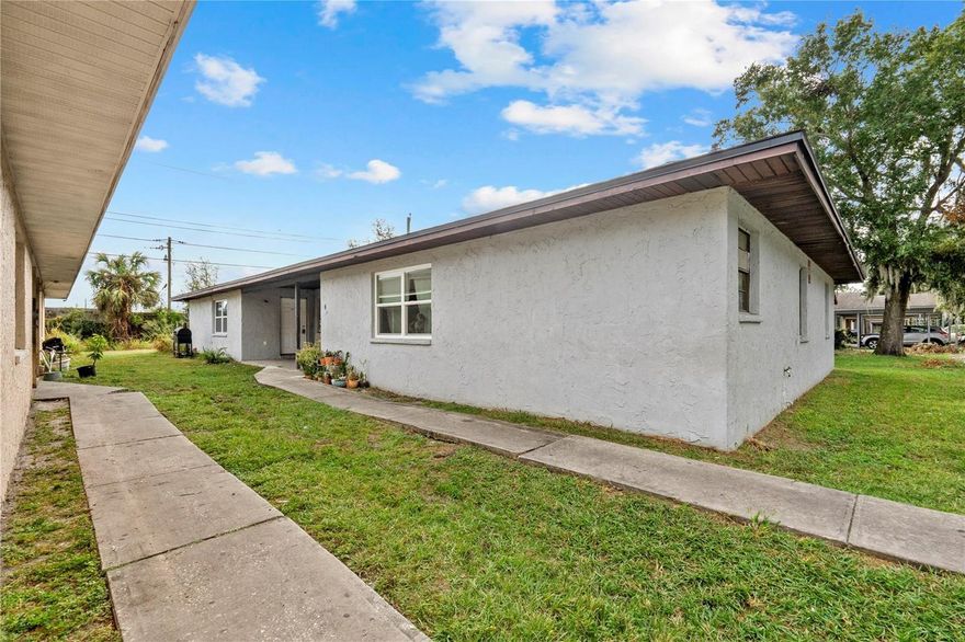 Attention Investors & House Hackers! This block Triplex has one occupied unit and a recently renovated vacant 3/2 & 1/1 unit.  Newer Roof (2022), New AC, New Granite countertops in 2/1 unit, new lower kitchen cabinets, updated electrical panels. New Fence. The 3/2 unit has New LVP floors, New Kitchen Cabinets, New Appliances, New Paint, two New Windows, New Light Fixtures, New Tiled Showers, New Vanities and more. The 1/1 Unit has been updated with New Paint, New Kitchen Cabinets, New Granite Counters and New Appliances. Separate water and electric meters paid by tenants. Great income producing property in the heart of Lakeland. Close to major highways, Tampa, and shopping malls.
Projected Rents: 1br $1100, 2br $1250, 3br $1500