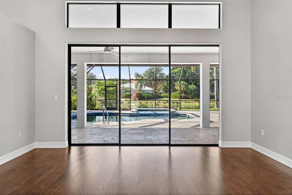 Photo of 8455 Woodbriar Drive, Sarasota, FL 34238 (MLS # A4676277)