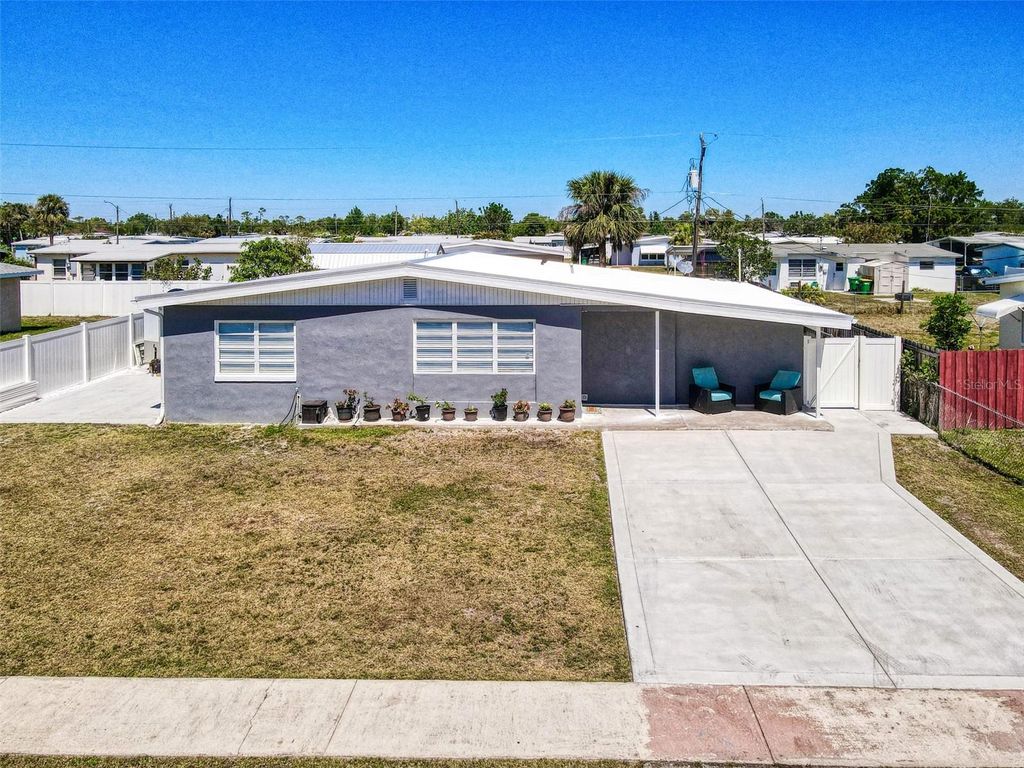 Photo of 21298 Austin Avenue, Port Charlotte, FL 33952 (MLS # TB8442663)