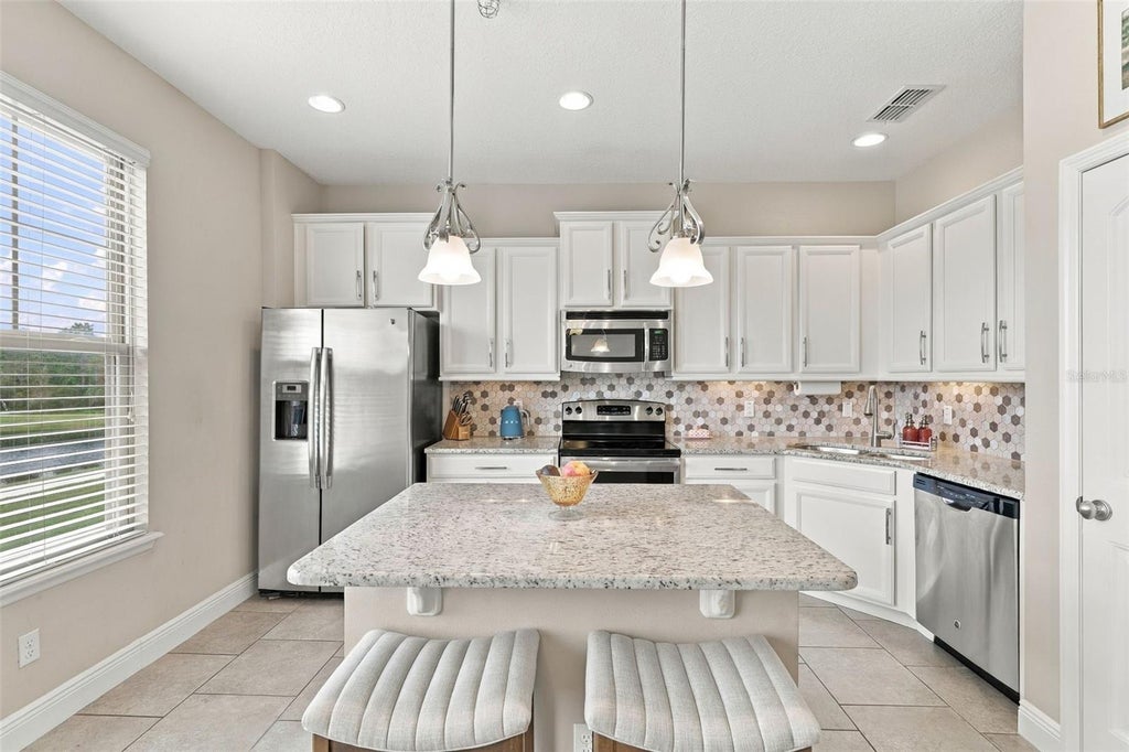 Photo of 10818 Sunset Ridge Lane, Orlando, FL 32832 (MLS # O6448958)