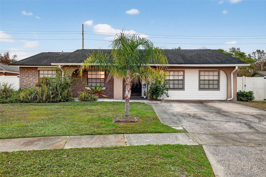 Welcome to 804 Pebblewood Drive! This charming 4-bedroom, 2-bath home offers comfort, style, and convenience. Inside, you’ll find a spacious living area with exposed wood beams and a cozy fireplace, creating a stylish focal point for gatherings.
The kitchen is a true highlight, featuring white cabinetry, stainless steel appliances, and a modern tile backsplash—perfect for cooking and entertaining. Enjoy meals in the adjacent dining space or relax in the expansive Florida room, complete with wood-look tile flooring and abundant natural light. This versatile space is ideal for hosting guests or enjoying quiet evenings.

The home offers a split-bedroom layout, providing privacy for the primary suite, while three additional bedrooms are perfect for family, guests, or a home office. Outside, the large, fenced backyard is great for outdoor activities and entertaining.

Key Features:

4 Bedrooms | 2 Bathrooms
Updated kitchen with stainless steel appliances
Spacious Florida room with bar seating
Cozy living area with exposed beams and brick fireplace
Large, fenced backyard
Convenient location near shopping, dining, and major highways

Location Highlights:
Just minutes from Bloomingdale Avenue and Bell Shoals Road, you’ll enjoy easy access to popular shopping centers, grocery stores, and a variety of restaurants. Whether you’re looking for casual dining, coffee shops, or retail options, everything you need is close by. Plus, you’re only about 20 minutes from Downtown Tampa, making commuting or enjoying city attractions simple and stress-free. Quick access to the Selmon Expressway ensures a smooth drive to work, entertainment, and Tampa’s waterfront.

Schedule a showing today!