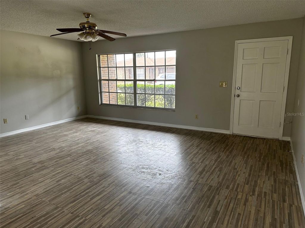 Photo of 590 Belltower Avenue #H, Deltona, FL 32725 (MLS # O6368362)