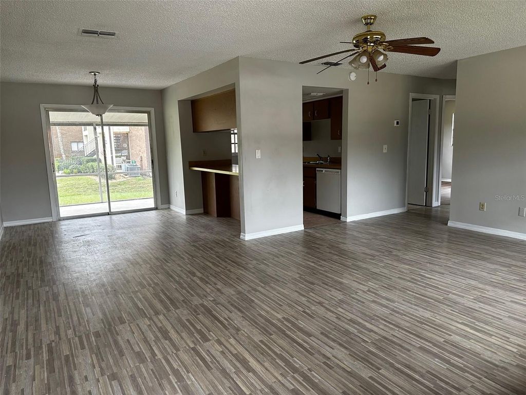 Photo of 590 Belltower Avenue #H, Deltona, FL 32725 (MLS # O6368362)