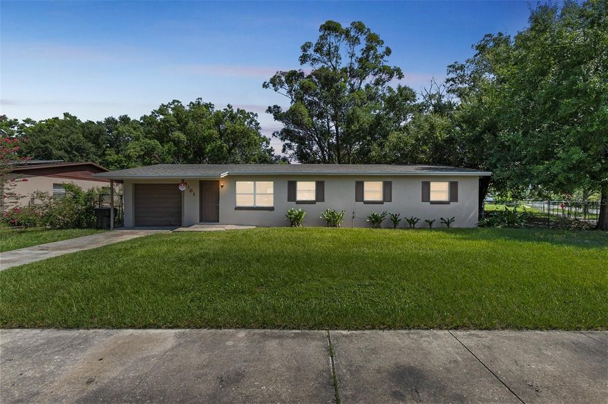 Welcome to this fully-renovated single-family, ranch-style home in Malibu Groves! Your future home sits on a oversized fenced corner lot This home boasts 1482 Sq ft and offers 4 Bedrooms and 2 Bathrooms. Updates with the renovation include ceramic tile throughout. The Primary Bedroom has a private bathroom which has been updated with a ceramic tile surround tub/shower combo, new fixtures, toilet, sink and cabinets. The shared bathroom for the additional bedrooms has been updated with a ceramic tile surround walk-in shower, new fixtures, toilets, sink, and cabinets. The Kitchen features upgraded cabinetry, a solid surface countertop, and stainless-steel appliances. New doors and ceiling fans throughout. New Central A/C installed July 2023, new roof installed May 2023. Fresh interior and exterior paint. Great location—close to Disney, 10 mins to Valencia College West Campus, 20 mins from downtown, zoned for one of the Top School Districts! Call now to schedule your private showing!