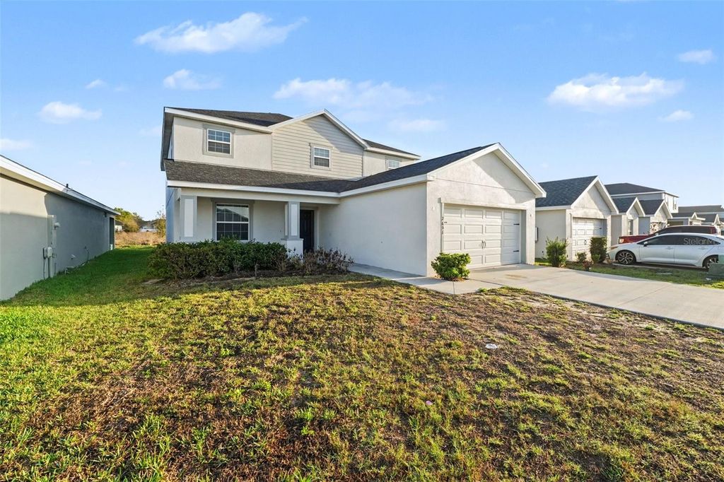 Photo of 2651 San Marco Way, Winter Haven, FL 33884 (MLS # TB8462844)