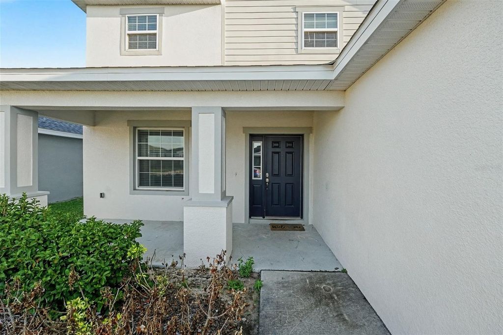 Photo of 2651 San Marco Way, Winter Haven, FL 33884 (MLS # TB8462844)