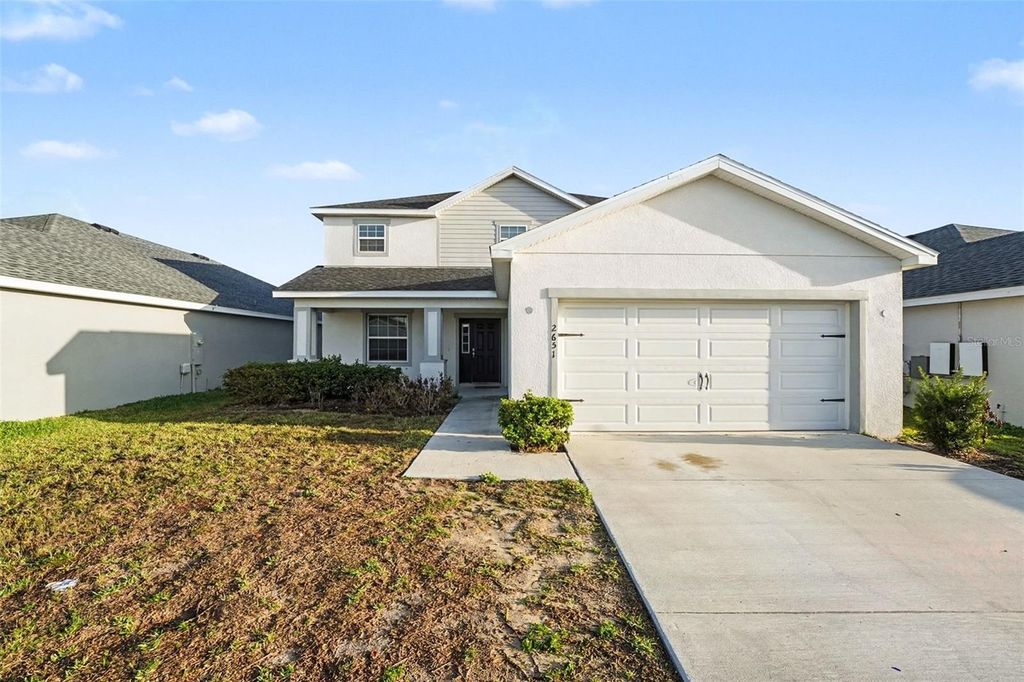 Photo of 2651 San Marco Way, Winter Haven, FL 33884 (MLS # TB8462844)