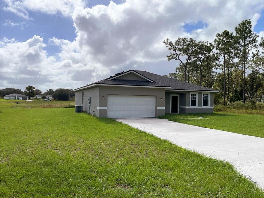 Enjoy a smooth ride on new paved roads that lead to your brand new construction 4 bedroom, 3 bathroom home located on an .24 acre lot. This light and bright home features 2 master bedrooms with en suites, 1 with double walk in closets and another with 1 walk in, plus two additional bedrooms and 1 additional bathroom. Make meals and memories in this kitchen with a granite island and surrounding countertops, soft close cabinets, whirlpool stainless appliances and large pantry to store all your groceries neatly. Enjoy the outdoors on the covered back
patio. Inside laundry room with W/D hook ups just off the 2 car garage.