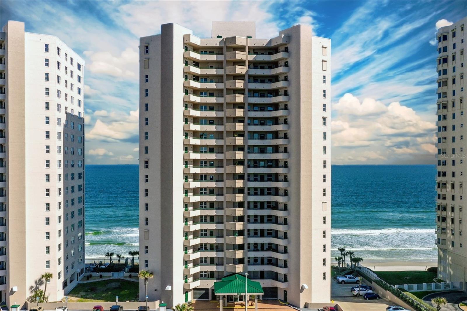 COME HOME TO THIS ELEGANT, MODERN TAKE ON RELAXES BEACHFRONT LIVING IN THS SE CORNER OCEANFRONT PLAN WITH PANORAMIC OCEANFRONT VIEWS THAT ENCOMPASS THE GREAT ROOM. EXQUISITE CONDOMINIUM HOME OVERLOOKING THE ATLANTIC OCEAN WITH AN ABUNDANCE OF NATURAL LIGHT AND MULTIPLE AREAS OF LOUNGING SPACES. THE OPEN CONCEPT LIVING AREA WITH TILE FLOORING SEAMLESSLY BLENDS INTO THE GOURMET KITCHEN WITH GRANITE COUNTERS AND FULLY INTEGRATED APPLIANCES. FEATURING 3 SPACIOUS BEDROOMS, EACH WITH THEIR OWN BATH AND WATER VIEWS. THE SUNSET ENTRY FEATURES A FLEX AREA THAT COULD BE A DEN, A WORK FROM HOME SPACE OR BREAKFAST ROOM. THE LIVING AND DINING AREAS PROVIDE VIEWS TOWARD THE OCEAN THAT PERFECTLY CAPTURE THE COASTAL LIFESTYLE. AN INDOOR LAUNDRY, STORAGE CLOSET AND PREMIER PARKING SPACE COMPLETE THIS TRUE GEM, NOT TO BE MISSED. 2 OCEANFRONT SWIMMING POOLS, CLUB ROOMS, FITNESS CENTERS IN AN IDEAL LOCATION IN DAYTONA BEACH SHORES, A BRIDGE AWAY FROM ALL THE SHOPS AND RESTAURANTS THAT PORT ORANGE OFFERS/
Square footage received from tax rolls. All information intended to be accurate but cannot be guaranteed.