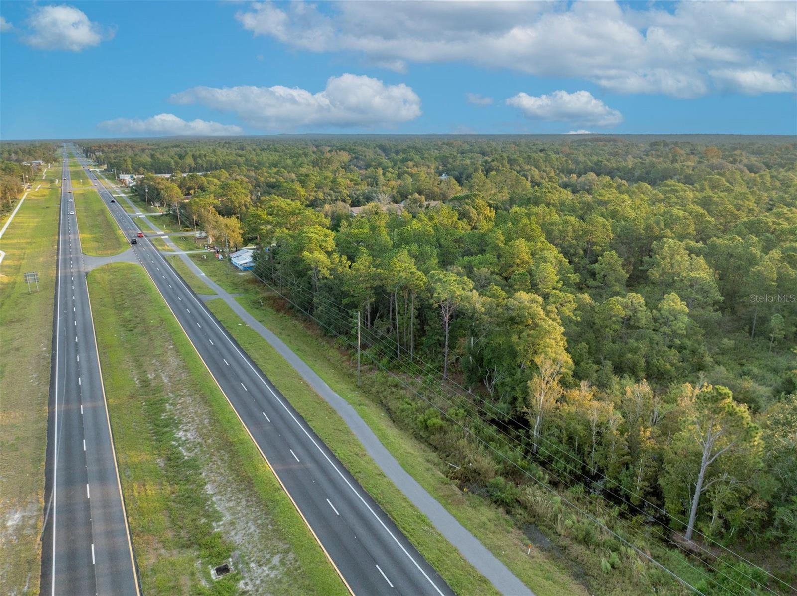 Welcome to this 5.46 Acres residential/commercial lot with premium exposure from S Suncoast Blvd. With close proximity to well established business including Publix, Walmart, Walgreens, 7-Eleven and McDonald's, this property has great potential for income generating business.