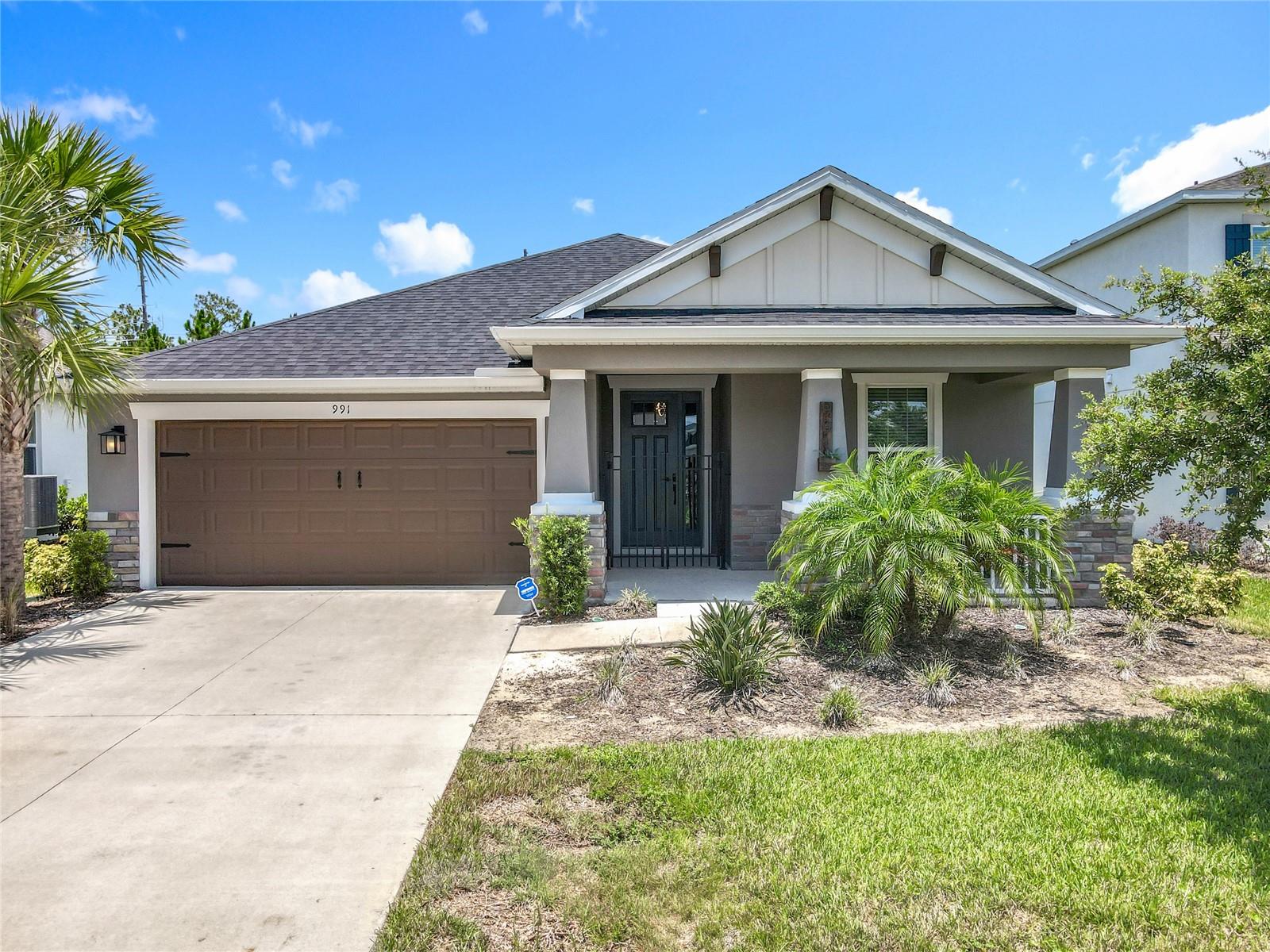 Welcome to this stunning and well-maintained turnkey 3-bedroom, 2-bath home in the sought-after gated community of Lakeside, located in the heart of Apopka. Where elegance meets comfort, this home offers undeniable curb appeal with a beautifully landscaped front yard, charming front porch, and a striking stone-accented facade.
Lakeside is a secured, resort-style community featuring a sparkling pool, playground, lake and dock access, and a fishing pier—perfect for enjoying peaceful afternoons by the water or catching the sunset over the lake.
Step inside to a bright and airy interior that has been meticulously designed with high and vaulted ceilings, an open floor plan, and stylish wallpaper that adds personality and warmth. The gourmet kitchen is a dream with its oversized island, abundant cabinetry, and ample counter space—ideal for everyday cooking or entertaining guests.
The spacious primary suite offers plush carpeting, large windows for natural light, a walk-in closet, and an ensuite bath with dual vanities, a garden tub, and a separate shower. A bonus room provides the perfect space for a home office or study.
Enjoy the oversized backyard with a covered porch—ideal for relaxing, outdoor dining, or weekend gatherings. This home is being sold unfurnished and is truly move-in ready - offering the perfect blend of style, comfort, and functionality. Don’t miss out—schedule your private showing today!