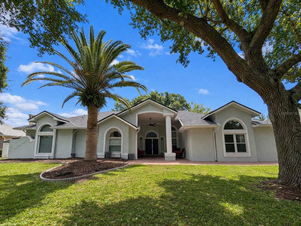 Photo of 7705 Apple Tree Circle, Orlando, FL 32819 (MLS # O6397003)