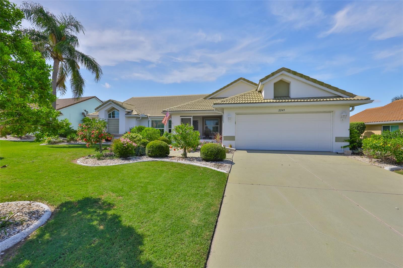 Undamaged by Recent Storms - Paradise Awaits! This stunning Berkshire model home remained untouched by wind, rain, or flooding during the past two major storms, peace of mind you can't put a price on. Step into your own private retreat featuring a sparkling resurfaced pool, enclosed by a newly screened pool cage with two brand new screen doors. Imagine waking up each morning and stepping outside for a refreshing swim, sipping your coffee to the soothing sounds of nature, this is Florida living at its finest. The pool area is a showstopper with a beautiful tiled deck with ample space for dining, sunbathing, or entertaining, newer pool equipment including heater, pump, and vacuum, new outdoor fans and outlets and EZ/Breeze windows in the covered patio. This home also boasts a new screened-in front porch, hurricane-impact front door and hurricane-rated windows throughout, new water heater with expansion tank, the entire home has been replumbed, new fridge and washer, 3-ton A/C (2020) Eco-friendly smart thermostat, fully remodeled kitchen and bathrooms with granite finishes, Hunter Douglas blinds and plantation shutters throughout, custom closets in every room, rich wood flooring in all 3 bedrooms, built-in Bose surround sound system indoor and out, stylish new lighting fixtures. Best of all...the HOA is only $40.00 a year! This meticulously maintained home is ready for new owners, could that be you? Don't miss out, schedule your private showing today!
