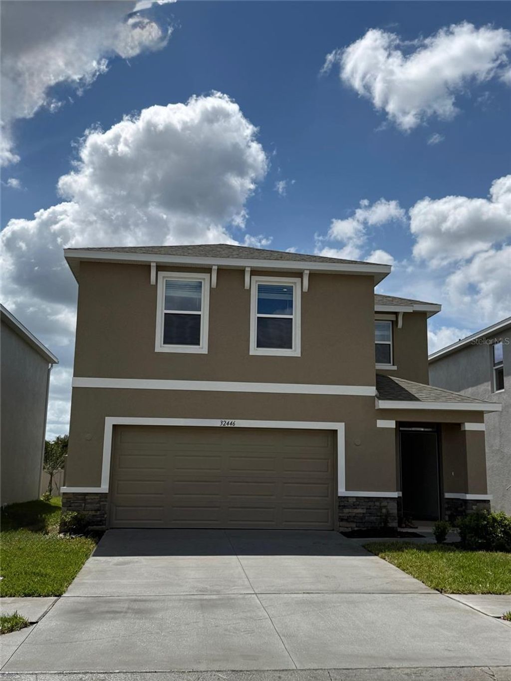 Photo of 32446 Weathered Oak Drive, Wesley Chapel, FL 33543 (MLS # J999706)