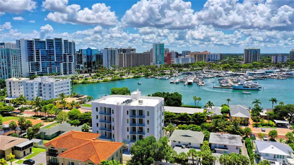 The Pearl is an exceptional and newer (2019) condominium in downtown Sarasota with a total of eight unique residences, two per floor, and no shared walls. The secure building leads to the entrance lobby and elevator which opens directly into your private foyer. Double doors lead to a bright and open floor plan with high ceilings and premium finishes throughout. The fabulous views of Sarasota Bay and the city are expansive and can be enjoyed from the main living area and the owner’s retreat. This well-designed floor plan has a spacious living room, dining room, and media room plus a well-equipped gourmet kitchen with European cabinetry, quartz countertops, tiled backsplash, and Jenn Aire appliances including a 6-burner gas stovetop and vented hood. Plenty of room for guests offering 3 bedrooms - each with an en-suite bath and access to an exterior terrace. In addition, there is an office, powder bath, laundry room with cabinets and wet sink, and a private enclosed 2-car garage. The owner’s retreat exudes luxury offering a generous-sized bedroom, two closets, a beautiful bath with extended vanity and plenty of storage, a separate soaking tub, an enclosed water closet, and a tiled shower with a built-in seat. Spend a relaxing afternoon by the heated pool & spa and enjoy a worry-free lock and leave lifestyle while you are on holiday. Golden Gate Point is a special neighborhood where you will often see folks walking or jogging along the brick-adorned streets. There are streetlights and doggie waste stations. It’s all about the location with easy access to St. Armand’s Circle and Lido Beach via the Ringling Causeway, plus everything Downtown Sarasota has to offer including parks, marinas, fine dining, tiki huts, and a plethora of arts and culture. Join the Golden Gate Point Association (GGPA) to meet new friends and par-take in community events.