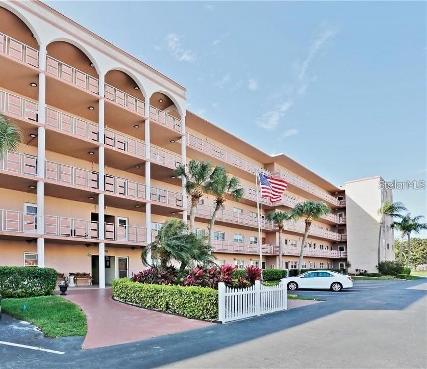 Take a look at this updated two bedroom two full bathroom condo in Five Towns. Premier 55+ community with multiple swimming pools, fitness centers, outdoor activities and a year round community to become a part of. All the work has been done. You can move in and start enjoying the lifestyle of active retirement or pre-retirement. Newer windows, heat and AC, no carpet - all tile and luxury vinyl plank floors. Stainless appliances, ceiling fans, huge great room with a wall of windows that looks out over a well landscaped yard and has a view of the pool that is right behind this building. Easy access to medical, shopping, restaurants and most importantly, the beaches of St Petersburg! This unit comes with a covered carport. Laundry facilities are on two of the floors. The condo fees cover all the utilities except electric. 1 small pet is allowed. There are restrictions to leasing prior to 12 months ownership and availability.