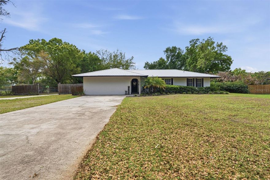 Tucked away in the highly sought-after Joshua Creek area, this property offers the kind of space and flexibility that’s getting harder to find. Set on a fully fenced acre, this 4-bedroom, 2-bathroom pool home blends updated comfort with room to truly live, work, and unwind. From the moment you step inside, the split floor plan creates a natural sense of privacy - giving the primary suite its own quiet retreat, complete with dual closets and space to settle in. On the opposite side of the home, two guest bedrooms feature walk-in closets, while the oversized fourth bedroom offers endless options; whether you need a home office, playroom, or space for extended family. A generously sized laundry room adds everyday function where it matters most. Out back is where this property really comes to life. The screened-in porch overlooks the pool, creating an easy flow for slow mornings, weekend gatherings, or winding down at the end of the day. Beyond the home itself, the setup here is what truly sets it apart. With a pole barn, a concrete block workshop, and a separate private entrance to the back of the property, there’s room for hobbies and equipment or simply the freedom to spread out without constraints. With a new metal roof already in place and updates throughout, the heavy lifting has been done, leaving you with a move-in ready home that still offers the space and versatility so many buyers are searching for. If you’ve been waiting for something with land, function, and a little breathing room, this may be the one worth taking a second look at.